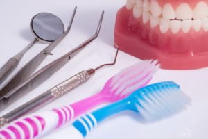 Dentures And Implants Still Need Oral Care